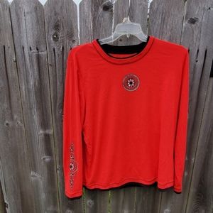 Red, long sleeved knit top